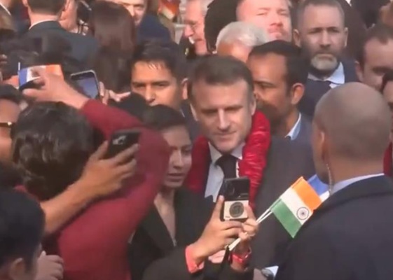 A delightful scene unfolds as French President Emmanuel Macron arrives at Rajasthan's Amber Fort in Jaipur. Welcomed by enthusiastic school students, President Macron shares a moment of cultural exchange. The event is graced by the presence of External Affairs Minister Dr. S Jaishankar and Rajasthan Deputy CM Diya Kumari, emphasizing the collaborative spirit between India and France.